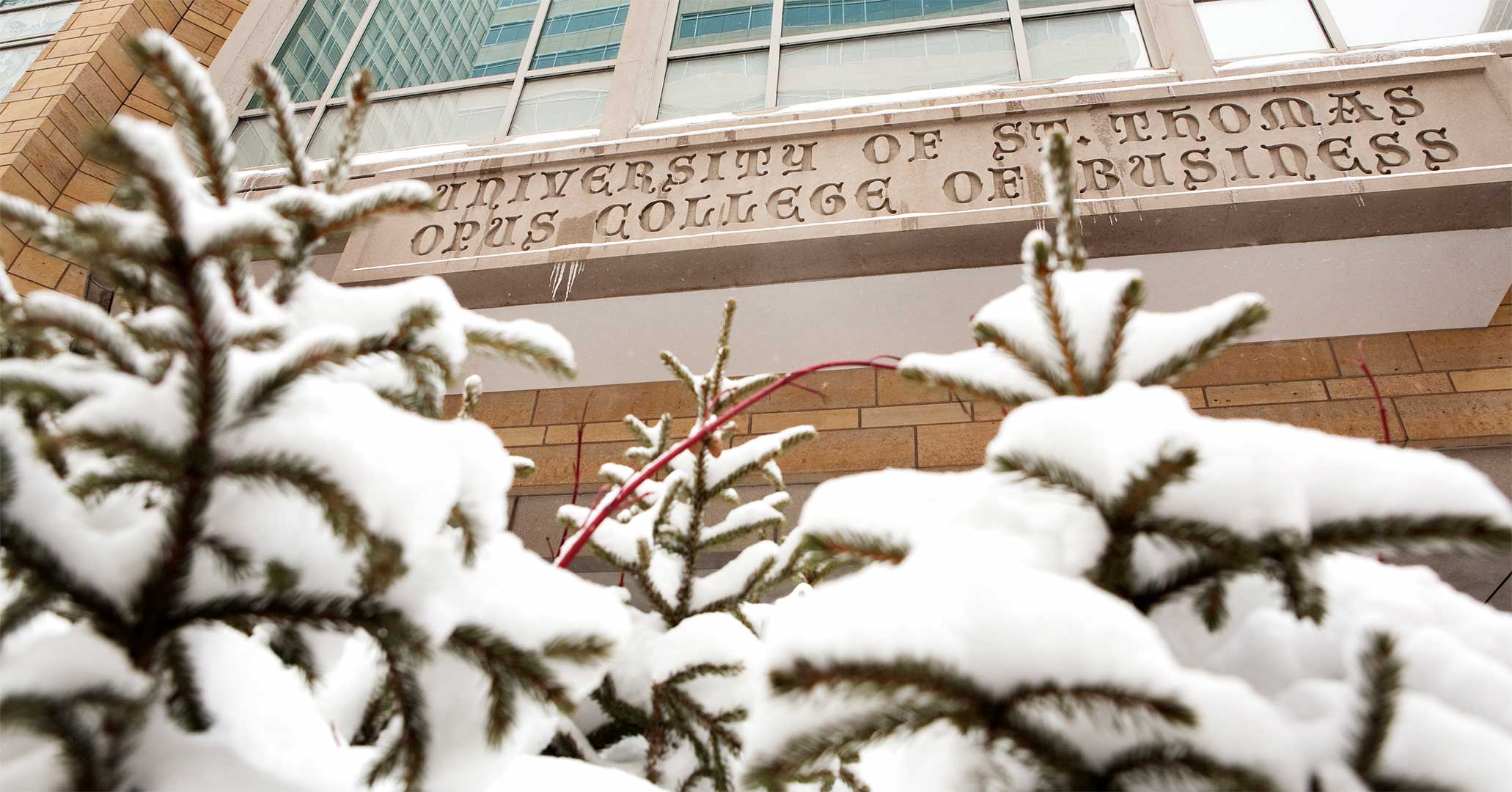 Exterior of Opus College of Business building in winter