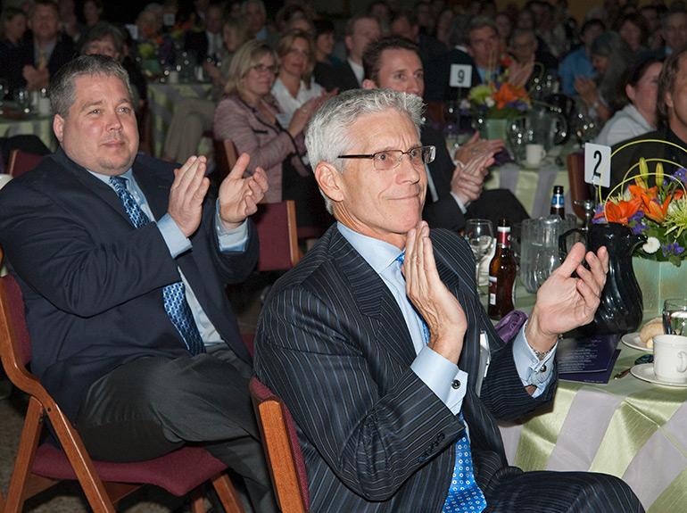 Guests clap following a talk at the annual Entrepreneur Awards Ceremony and dinner.