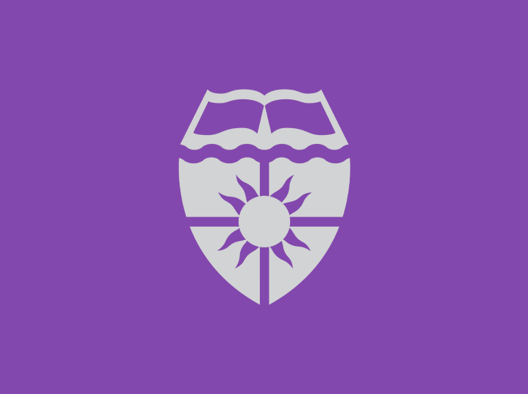 University of St. Thomas shield.