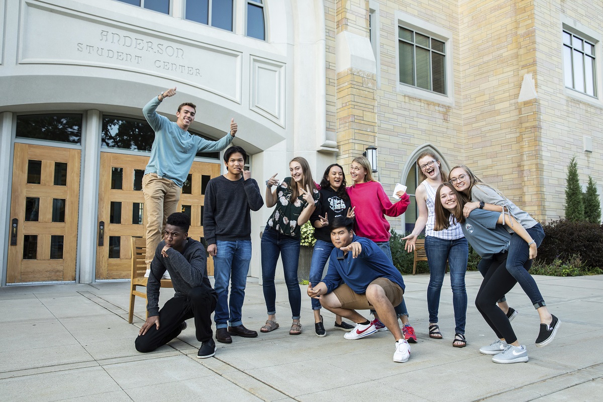 GHR Fellows make funny faces and pose together outside of Anderson Student Center.