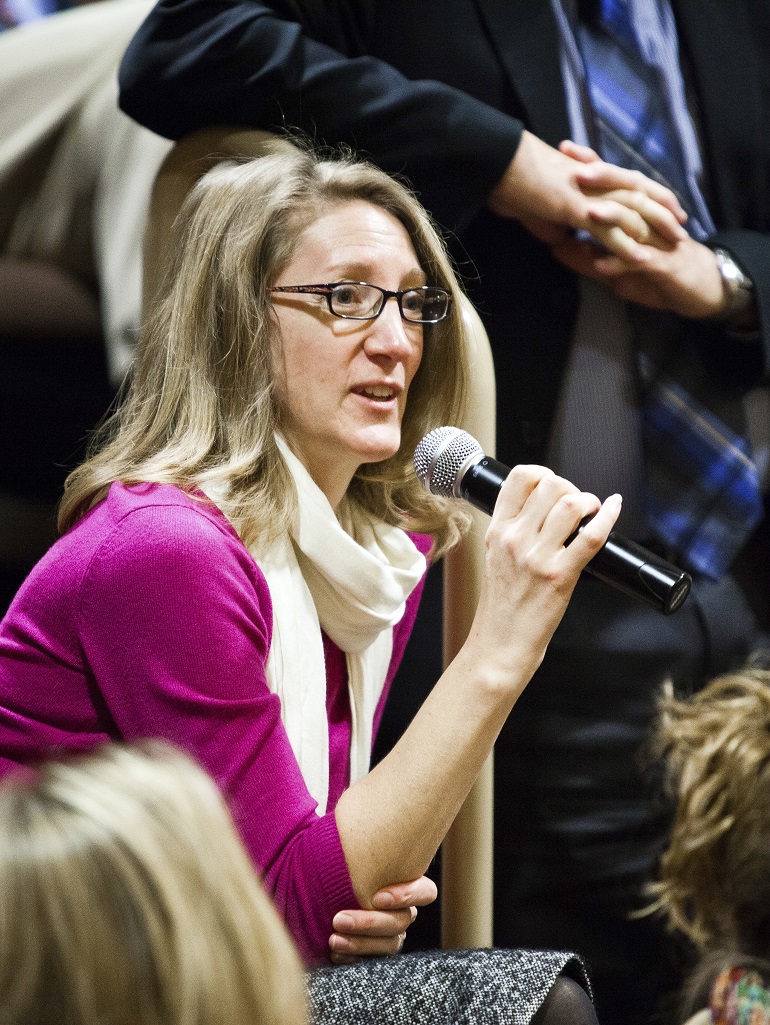An audience member asks a question at the University of St. Thomas Executive Conference on the Future of Health Care