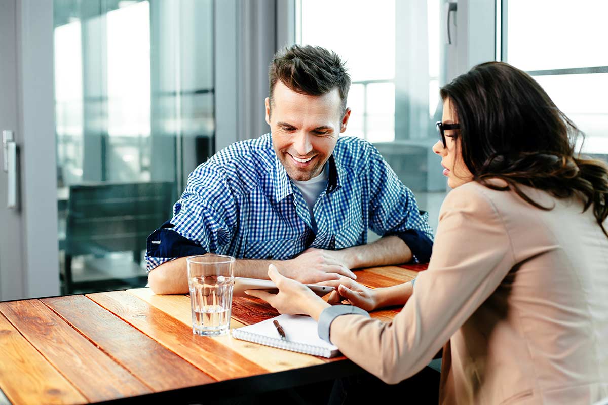 Two people reviewing data together.