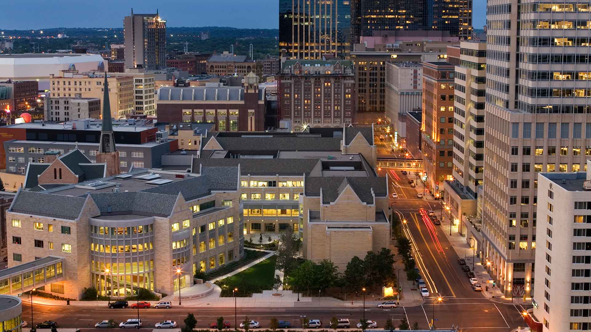 Arial view of the Opus College of Business in Minneapolis at twilight.