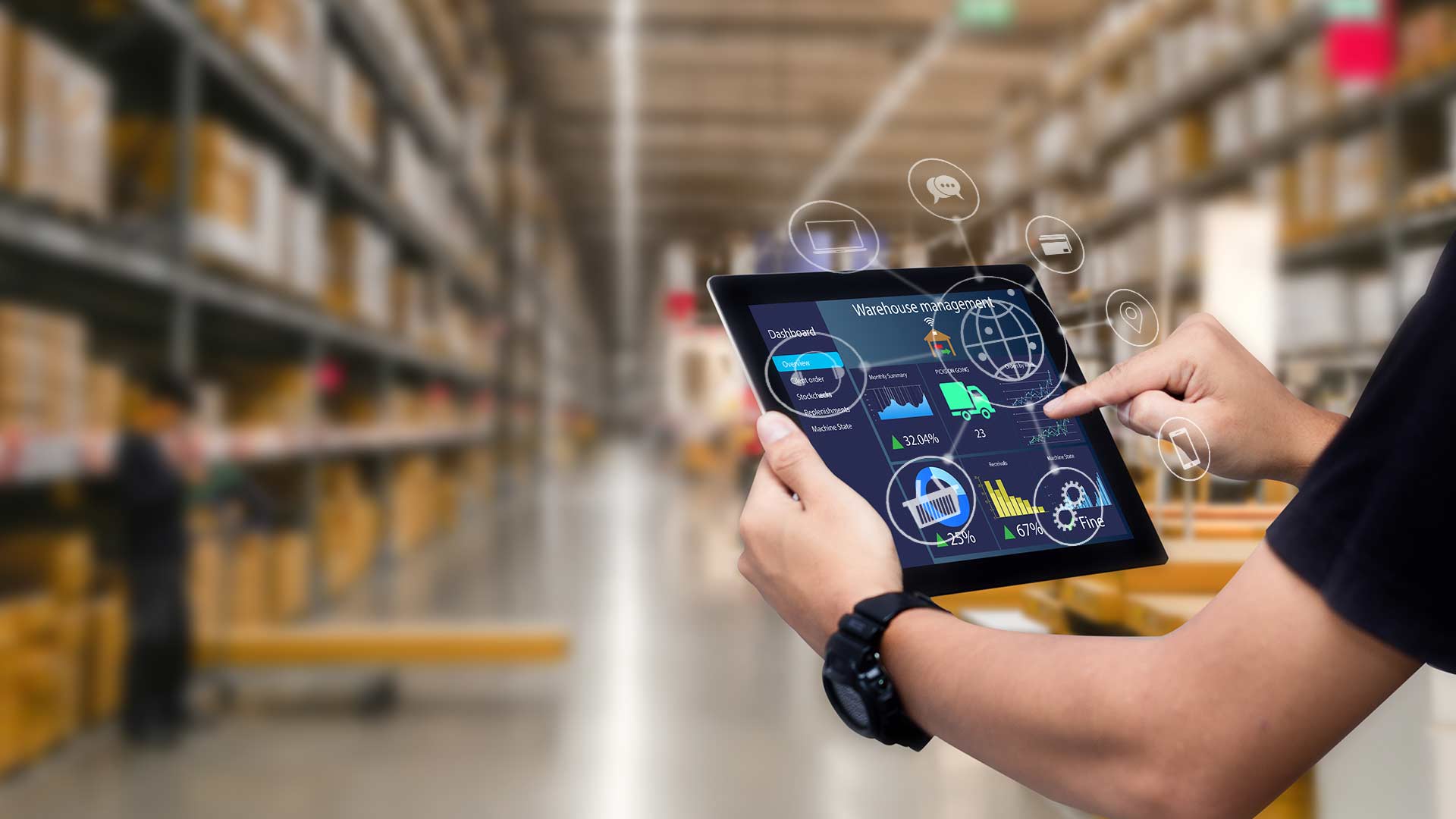 Research is performed on a tablet in a large warehouse.