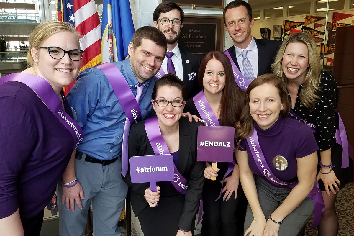 Bridget Rissmann and others showing support for the Alzheimer's Association.