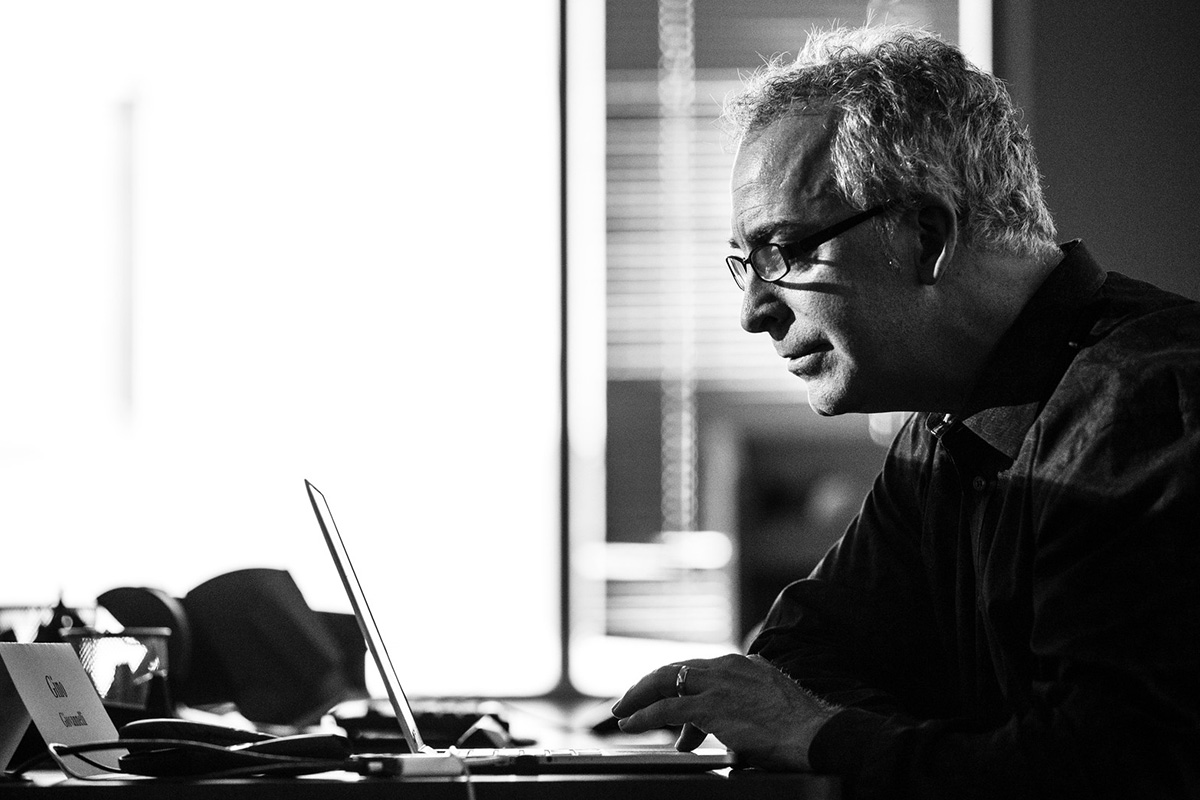 Gino Giovannelli on his laptop