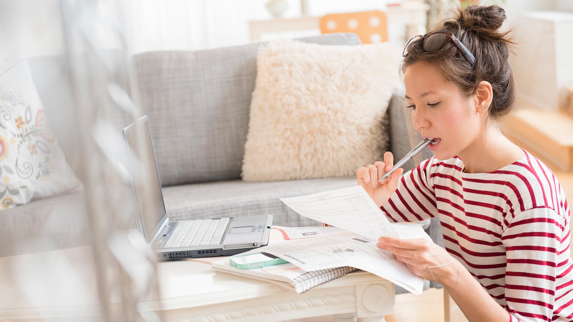 Student doing assignment using the laptop.