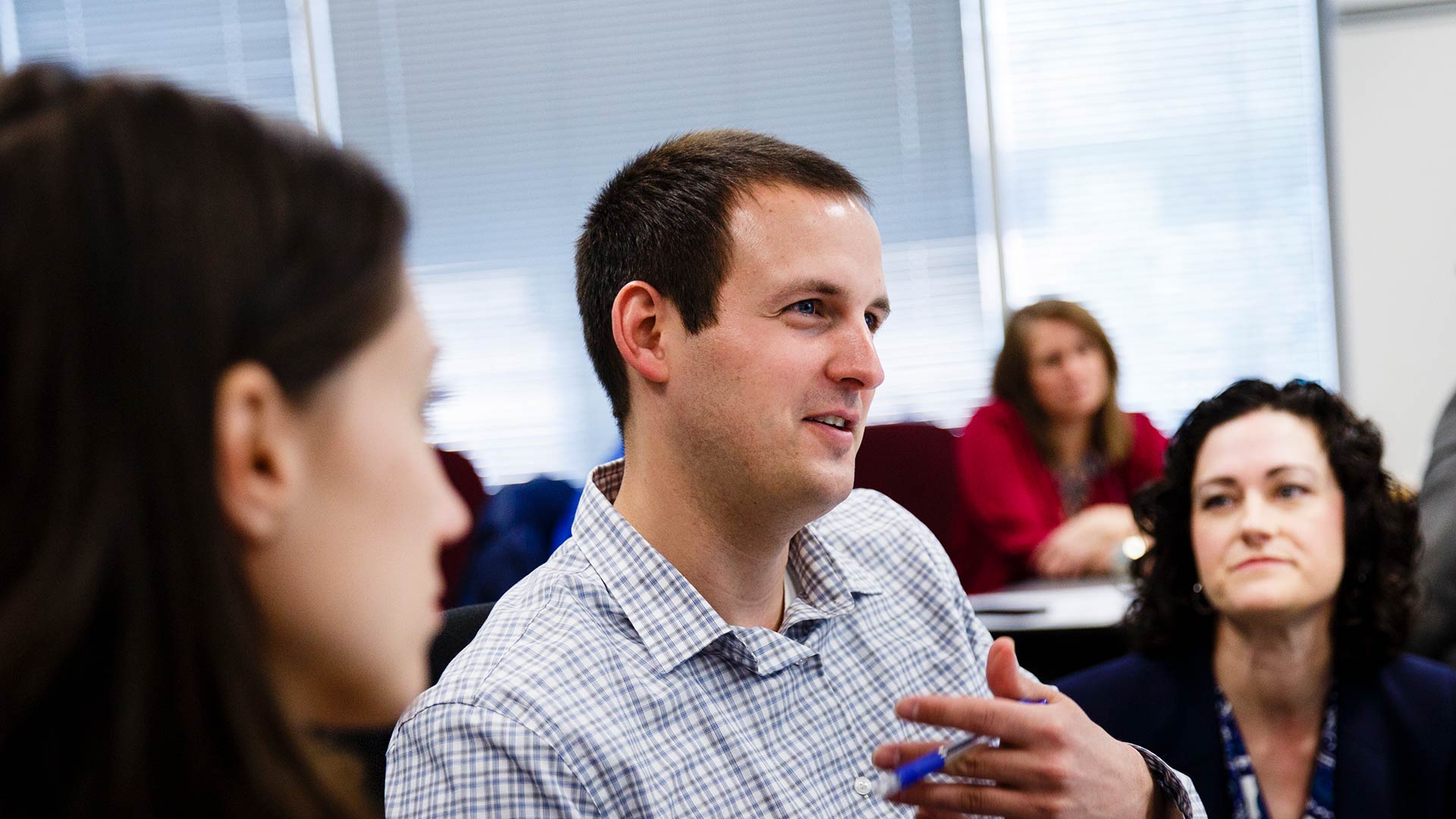 Students engage in a listening exercise during a "Coach Approach to Management" OCB Executive Education Class.