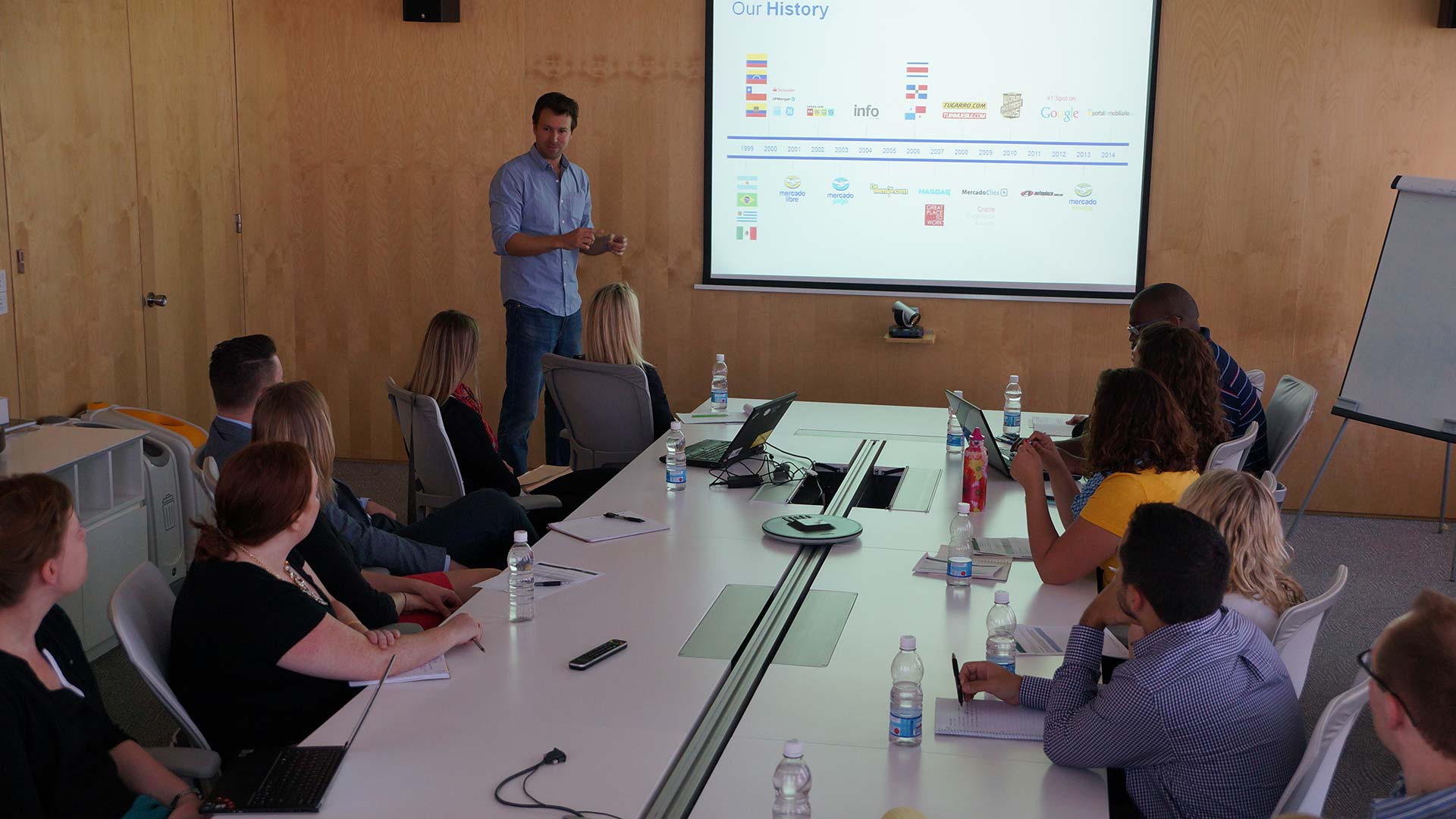 Professor taking a business class in a conference room.