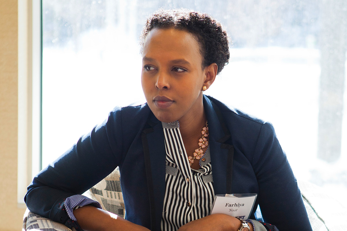 A guest sitting and looking into the distance thinking.