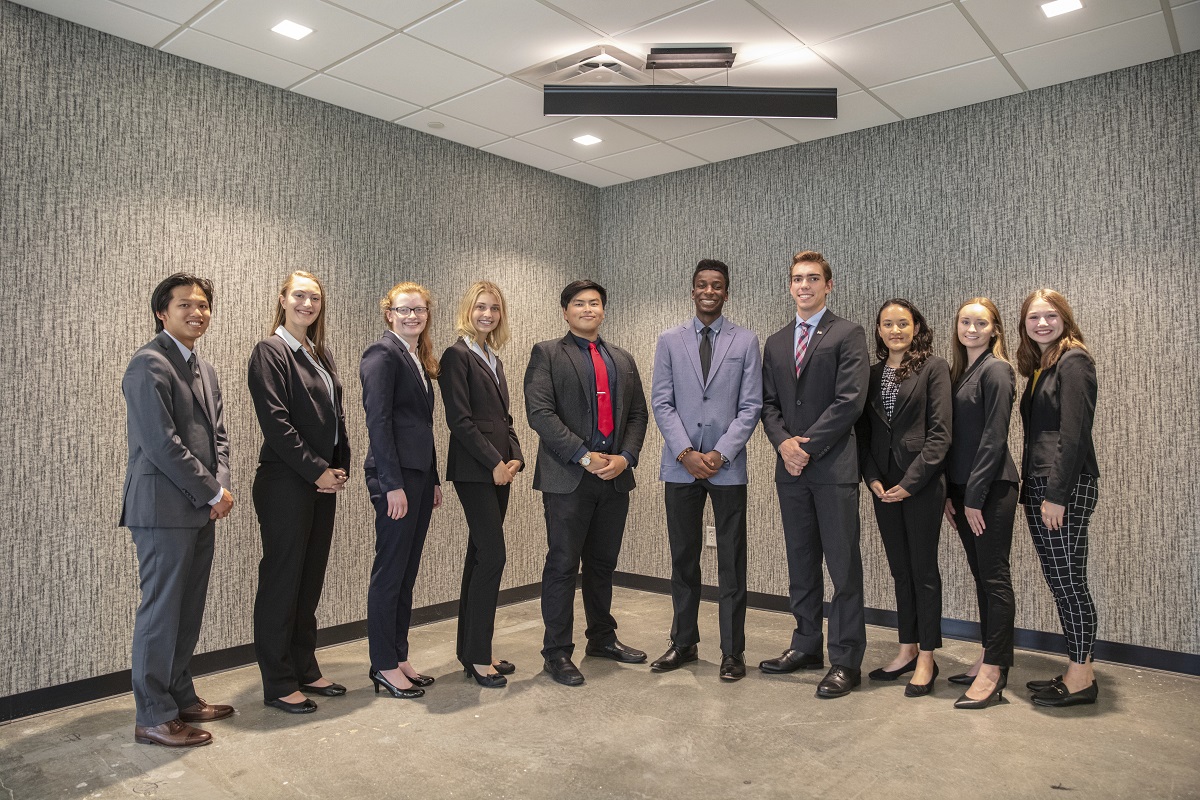 GHR Fellows pose together in formal wear. 