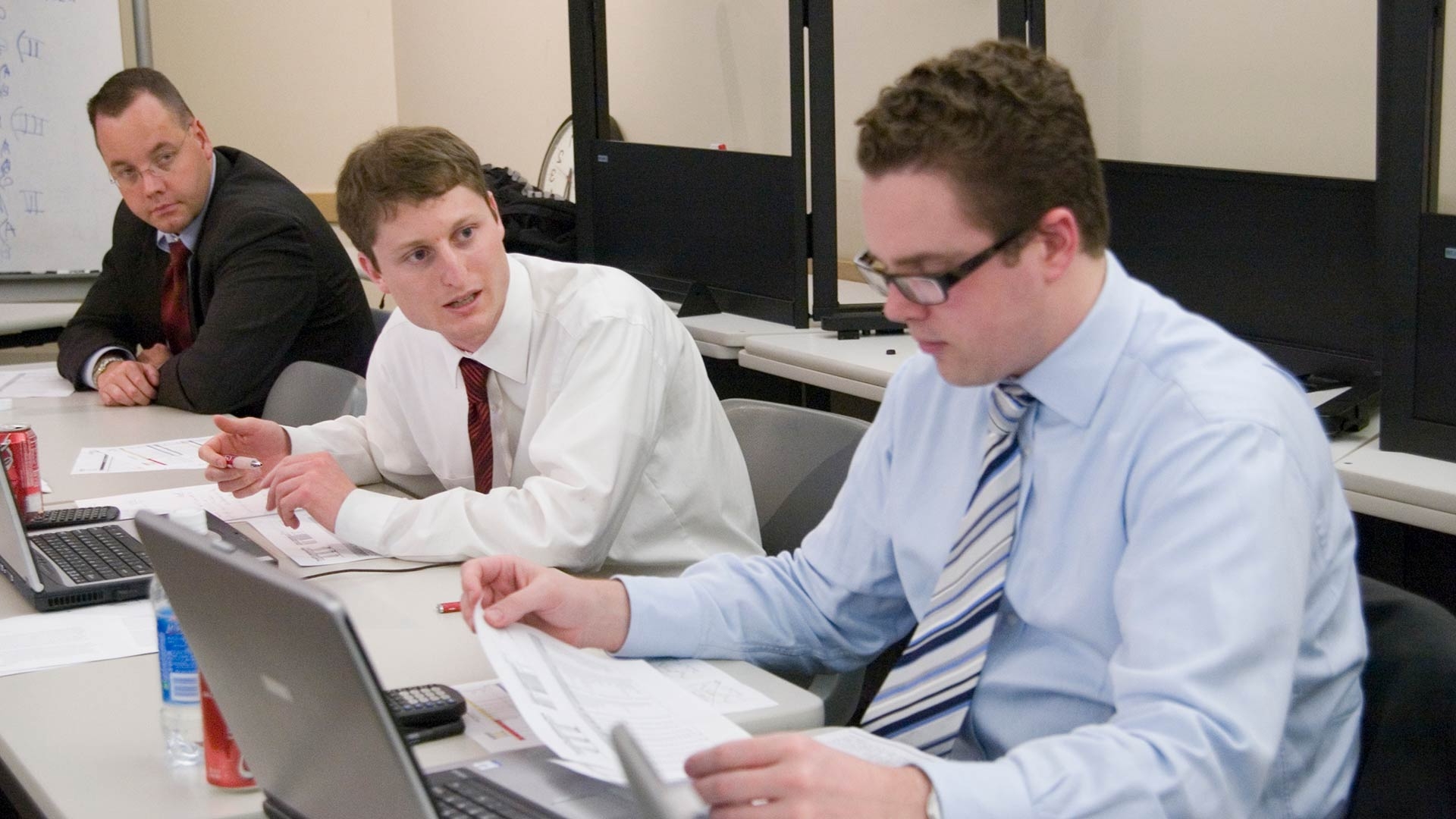Group of finance students studying in a classroom. 