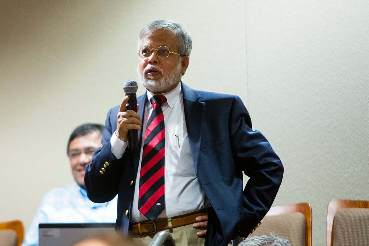 A skillful individual speaks during a ceremony.