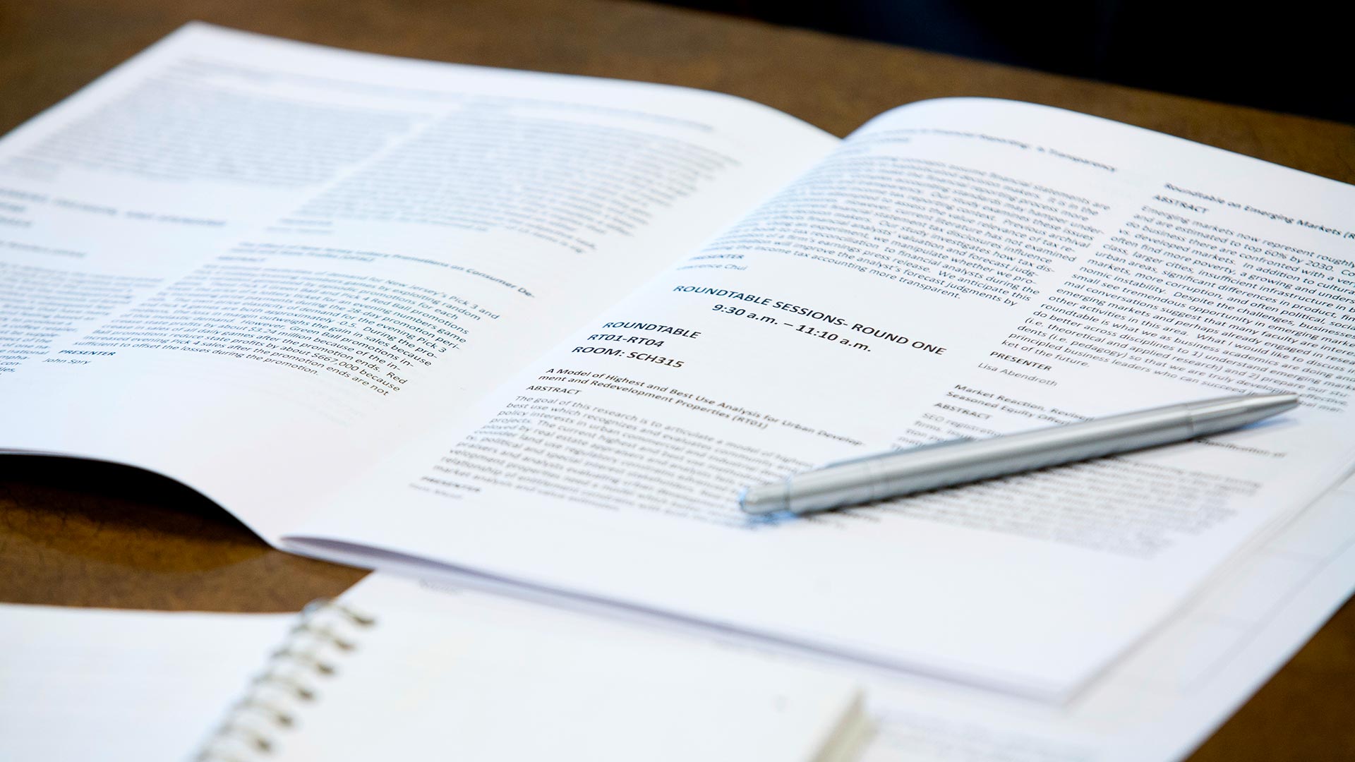 Event program with discussion points for a research discussion.