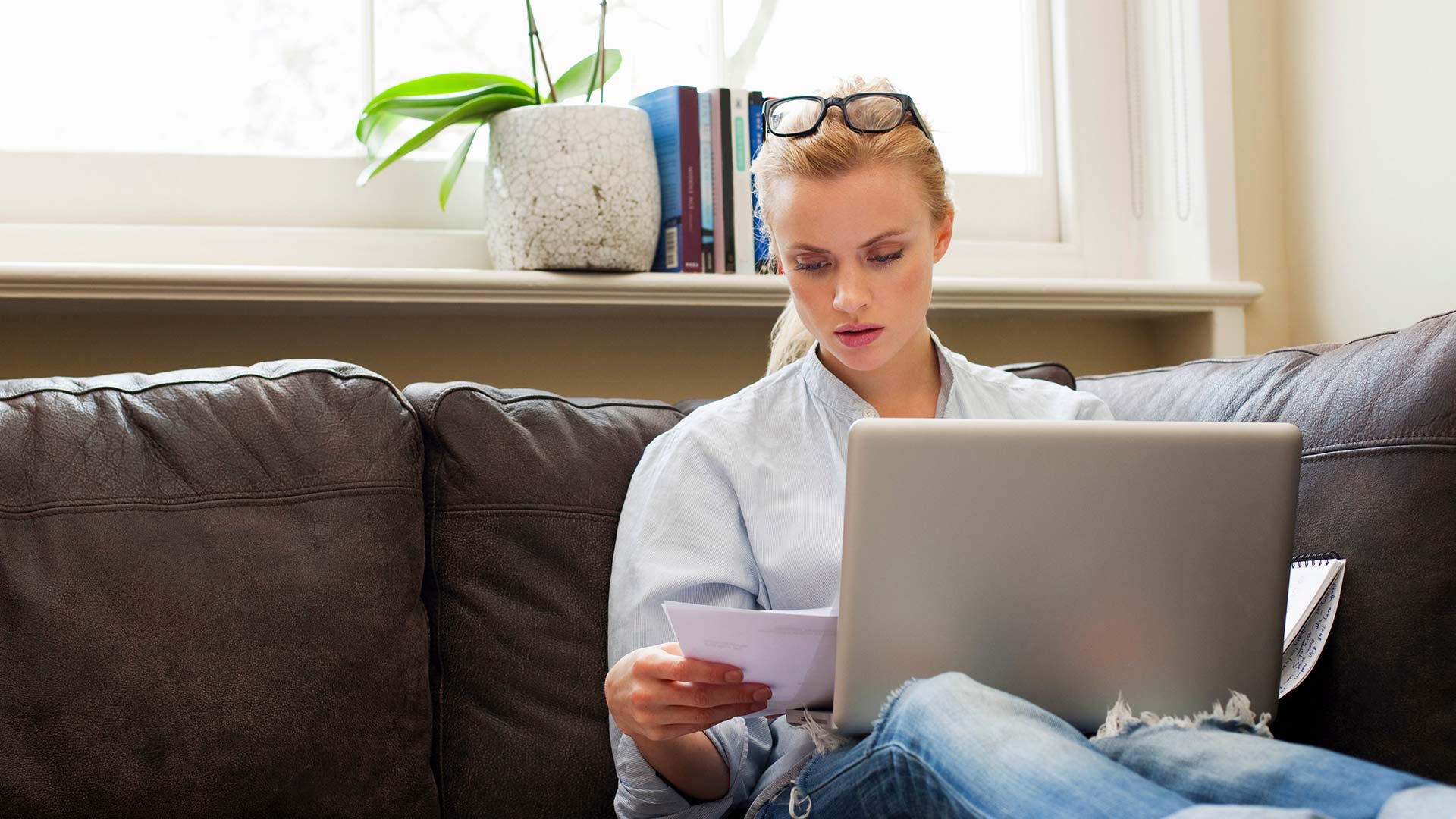 adult female studying on a laptop