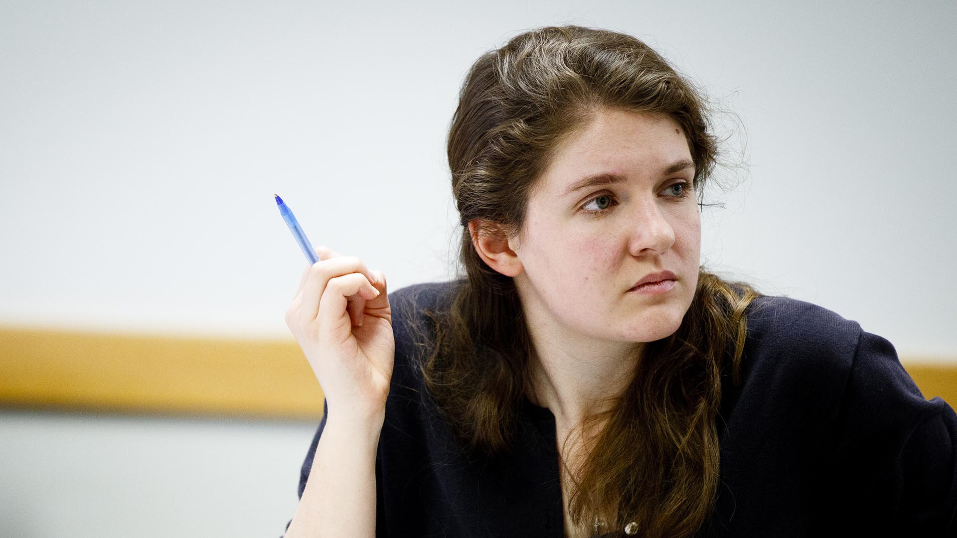 Student listens to a discussion during a Shakespeare class in the John Roach Center for the Liberal Arts.