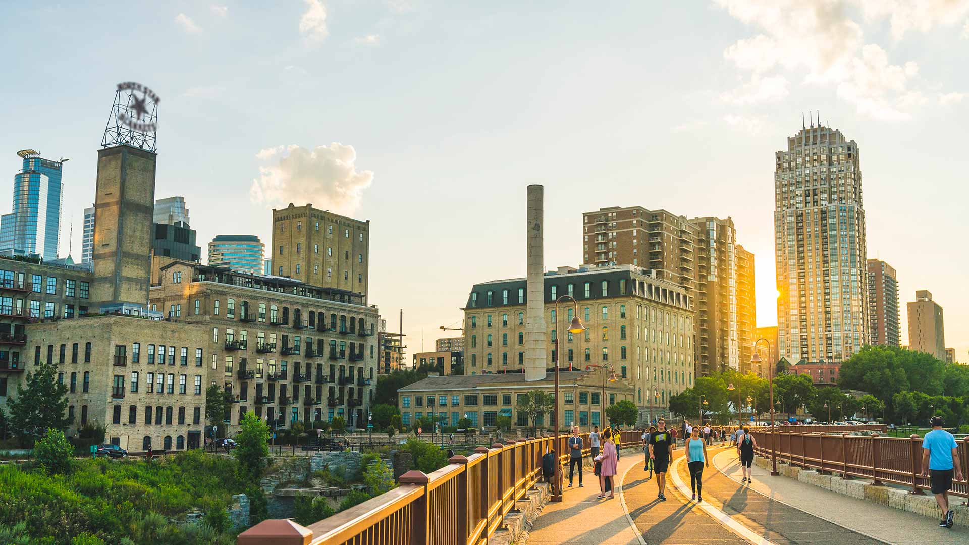 People walking on a bridge in minneapolis