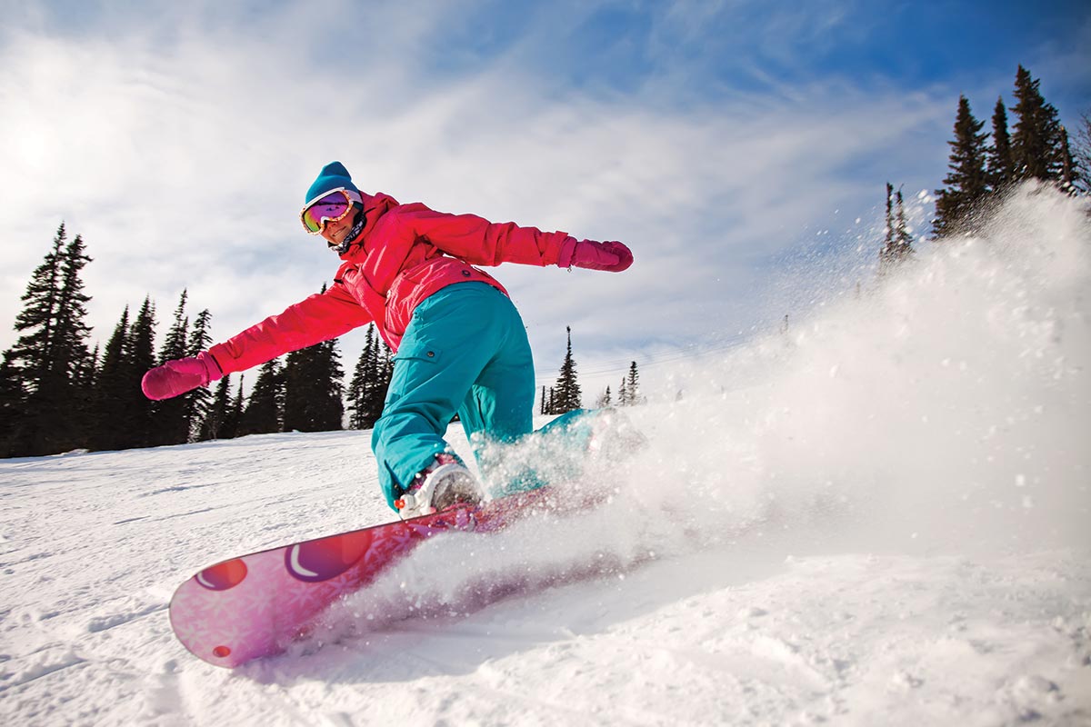 A person snowboarding down a mountain