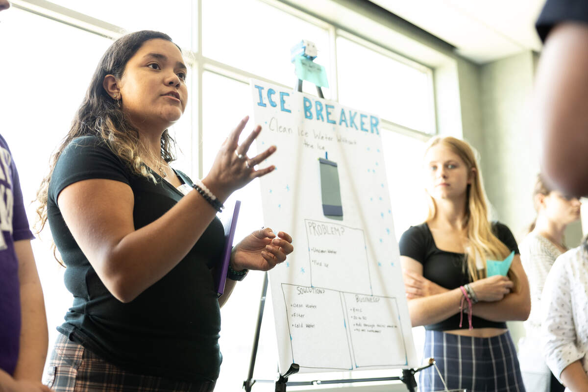Students presenting at an event