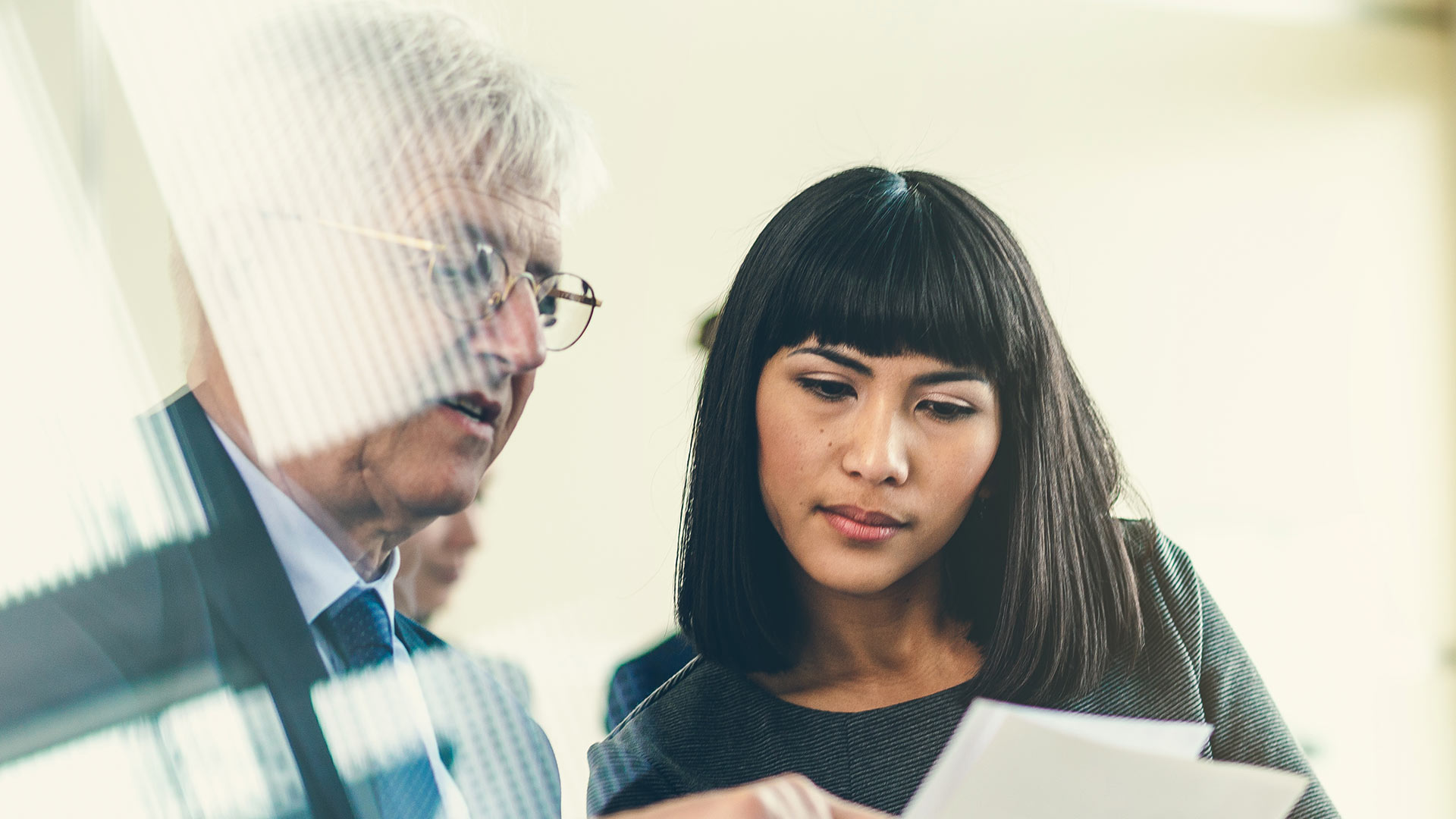 Two individuals reviewing data.