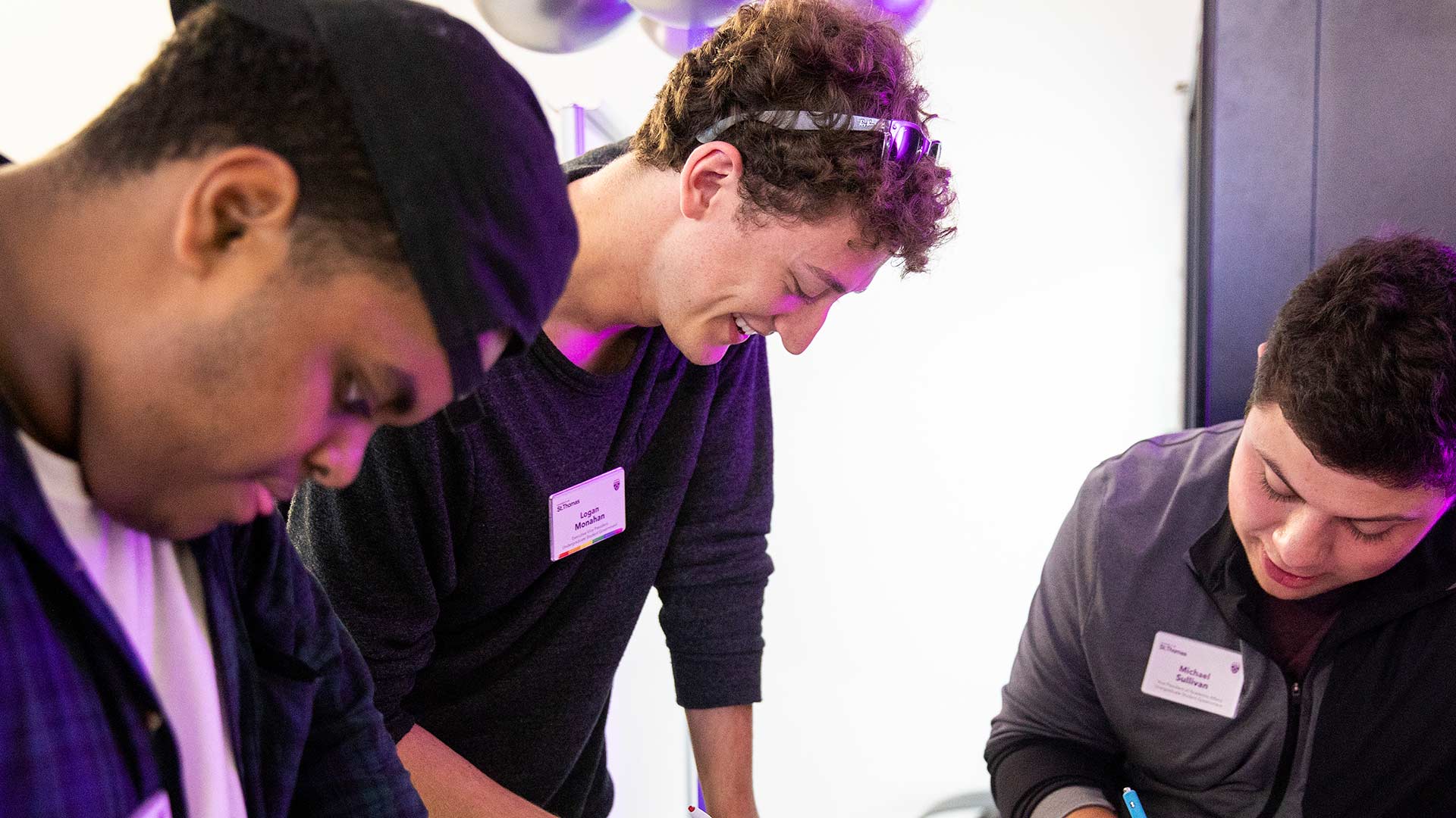 Students gather to register for an event.