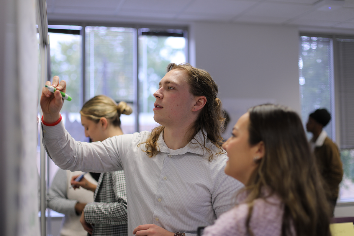Students working on whiteboard