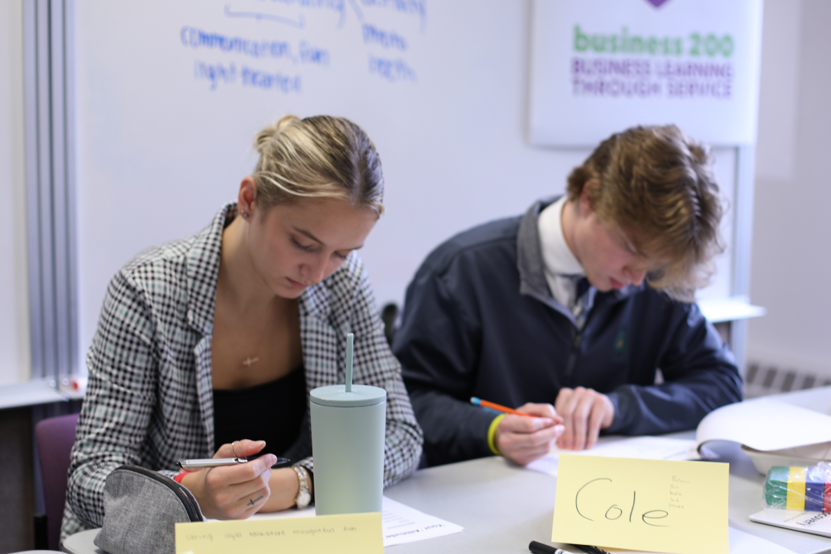 Two students working diligently