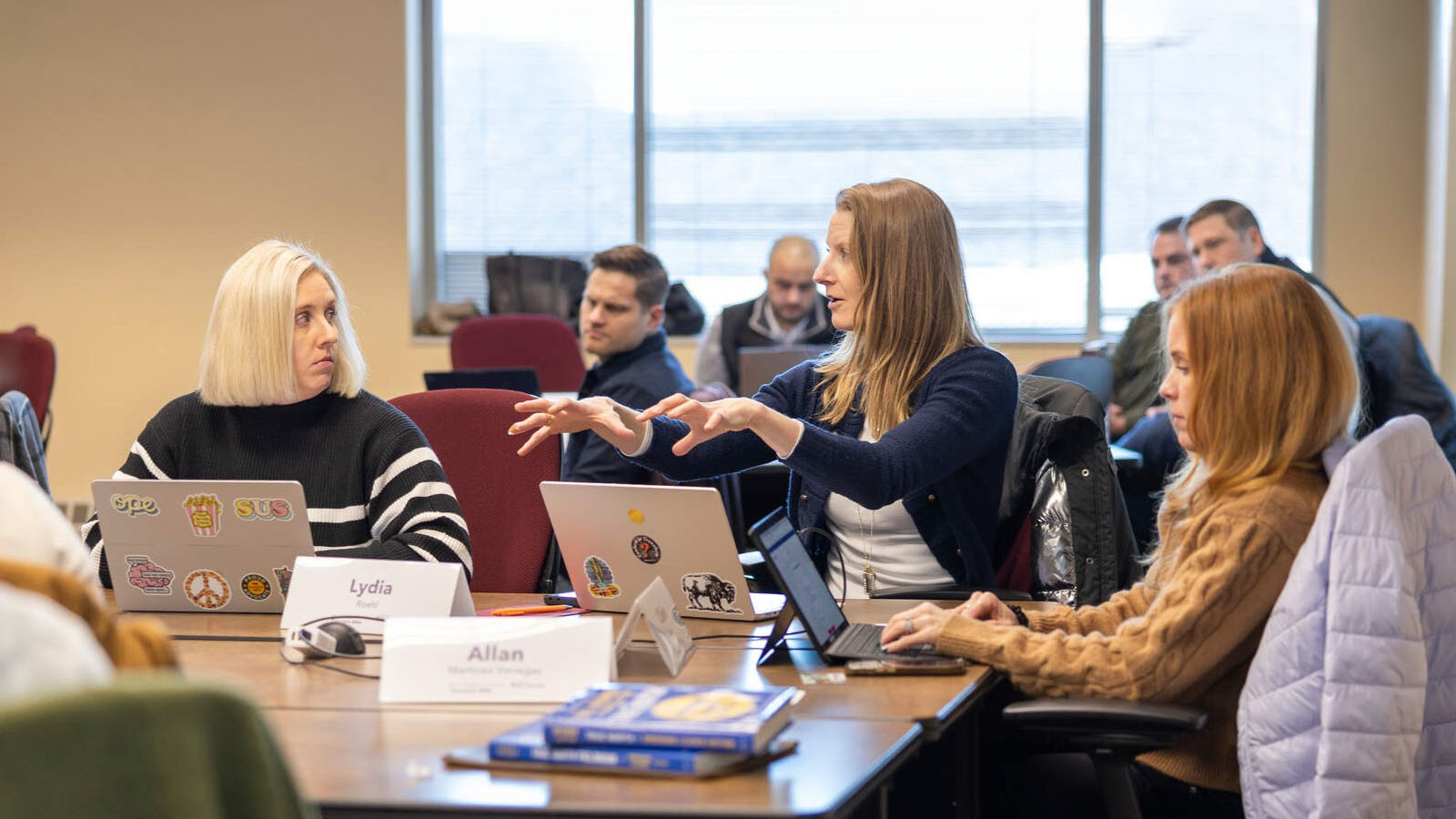 Executive MBA students participating in a class