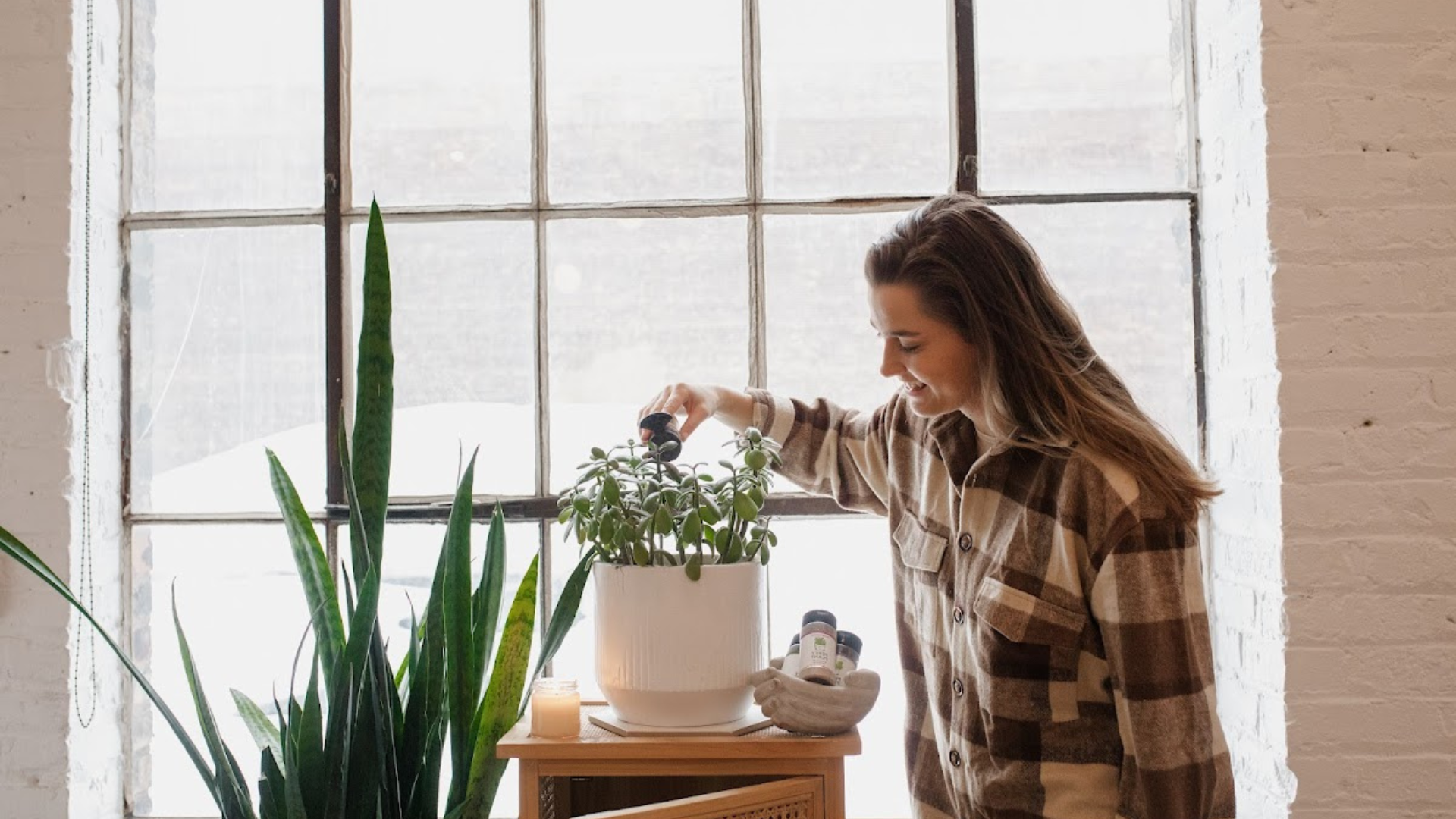 Liz Murphy watering plant