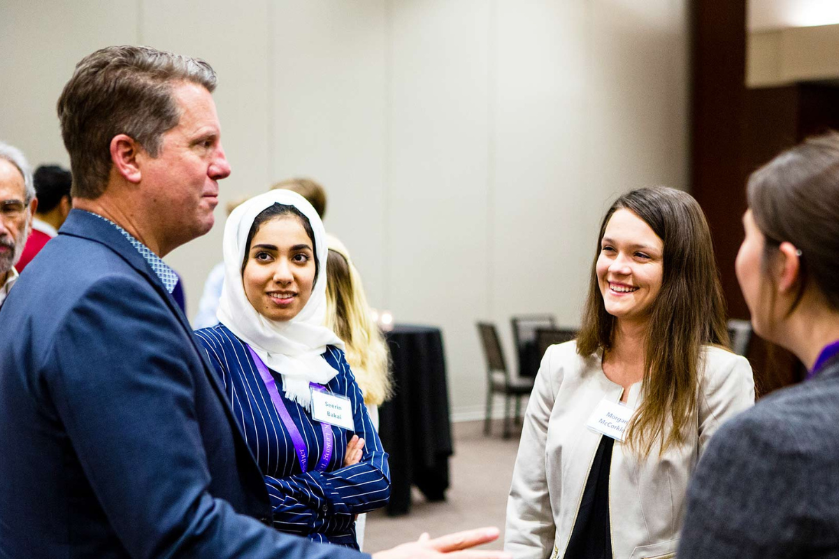 Group of Schulze School students and staff mingling