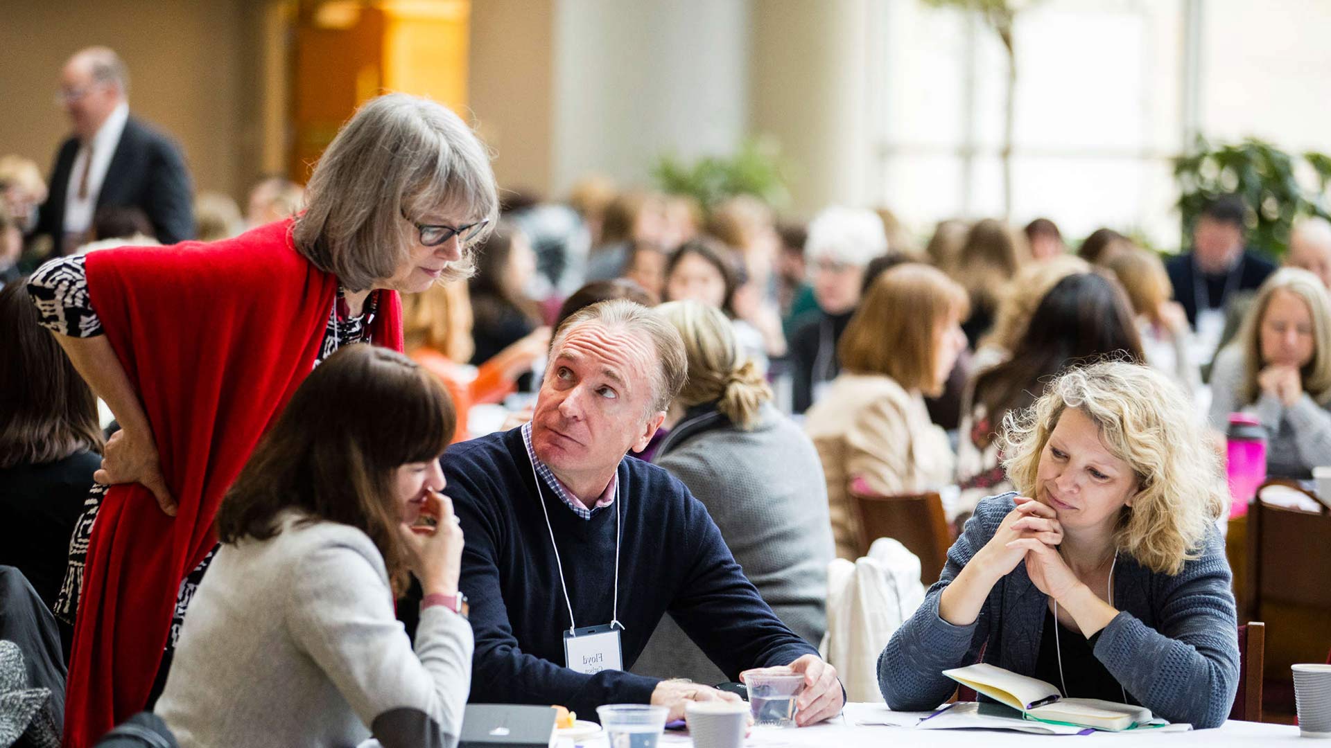 Attendees work on a group exercise during the Executive Coaching in Organizations Conference in the Schulze Grand Atrium in the School of Law building in Minneapolis on January 19, 2018. 